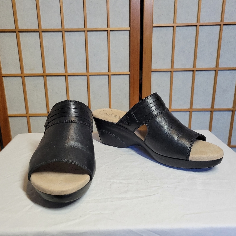 Clark's black slip on wedge sandals. Womens size 9.5 Wide.